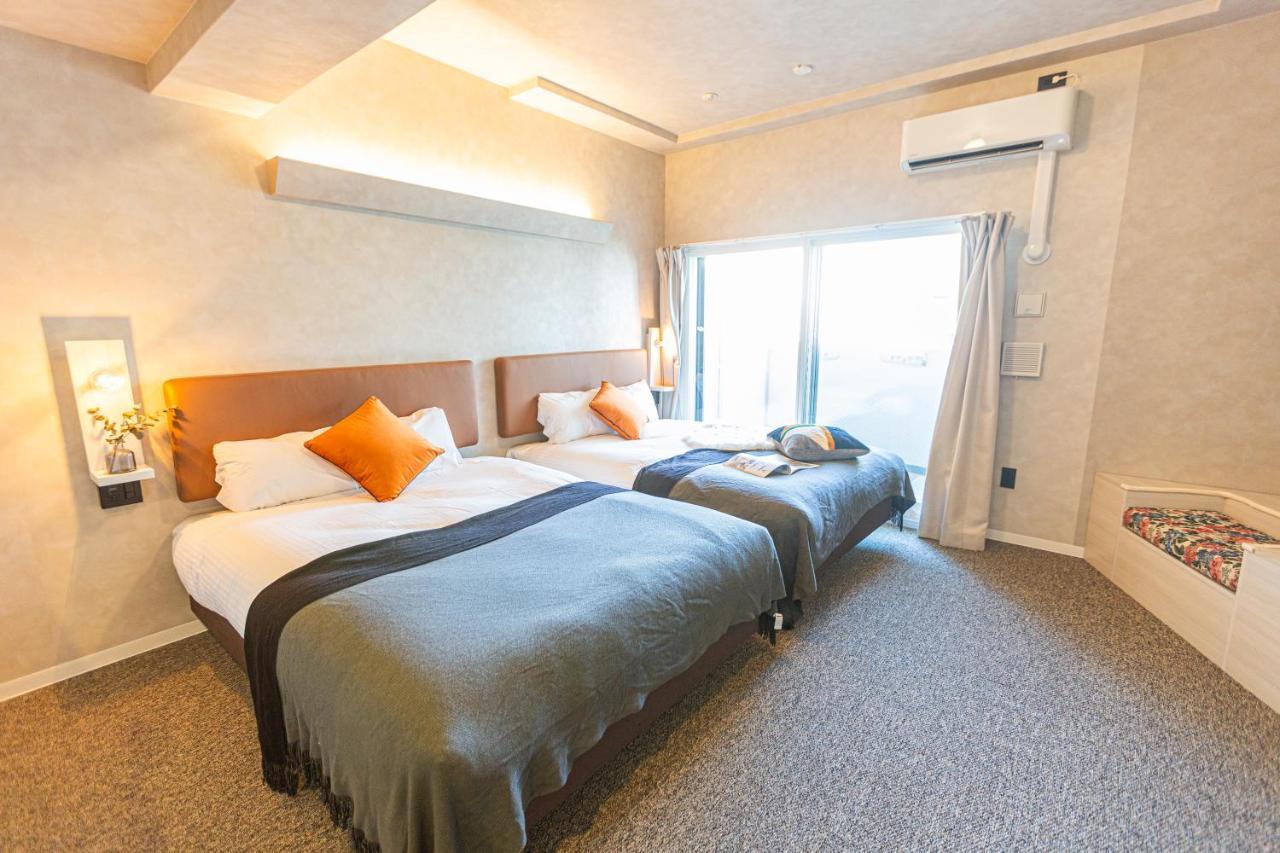 Apartment Hotel 11 Umeda Osaka Bagian luar foto