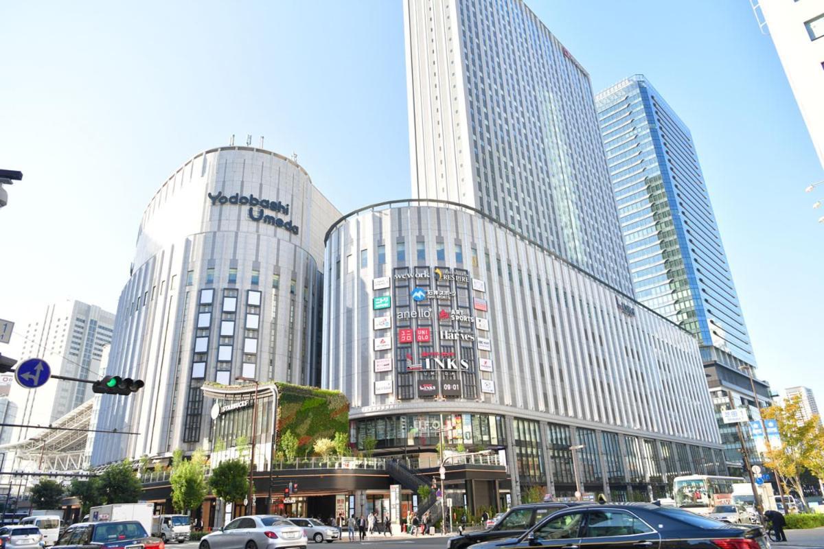 Apartment Hotel 11 Umeda Osaka Bagian luar foto